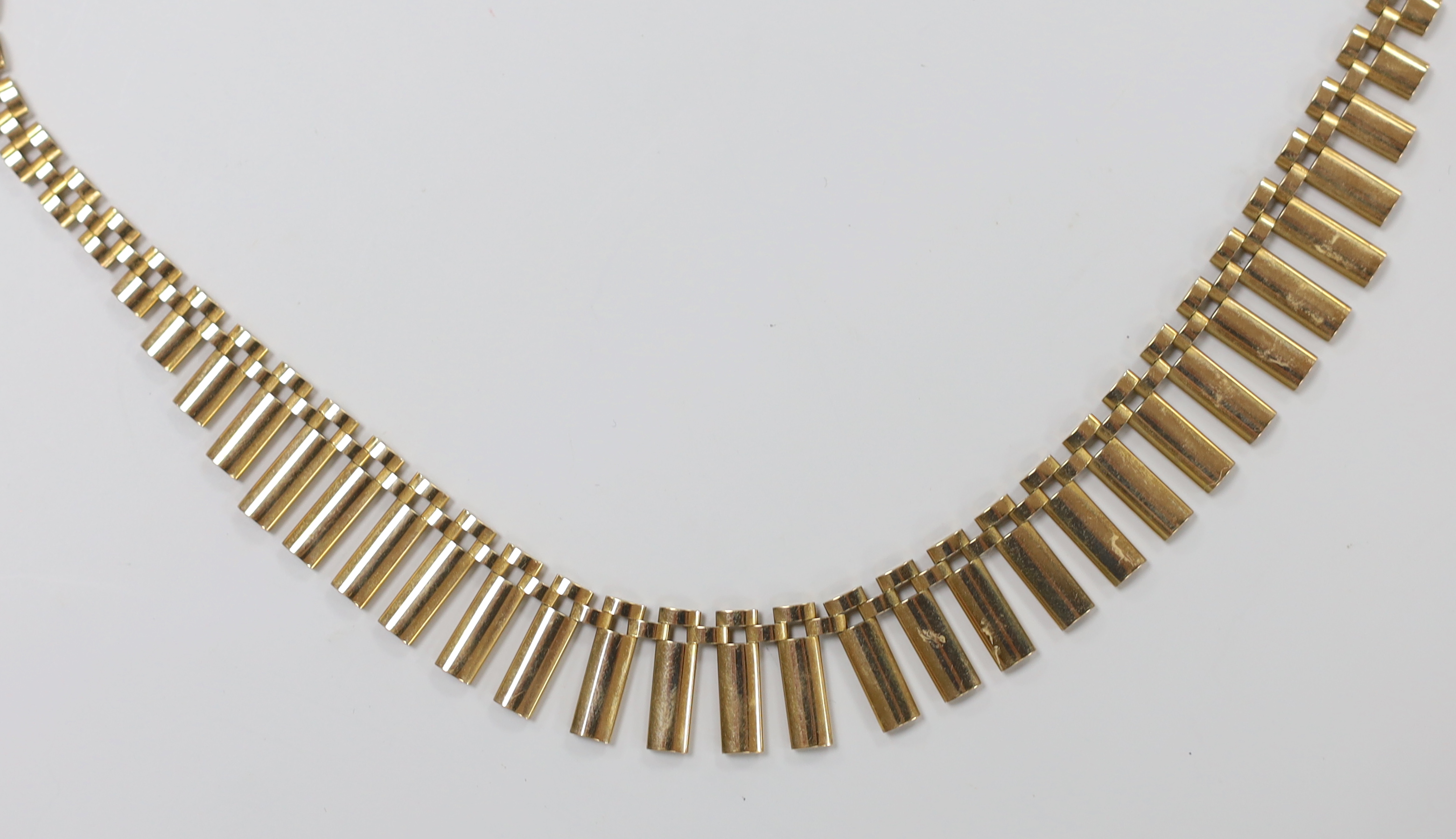 A 1970's 9ct yellow gold fringe necklace, 40cm, 20 grams.